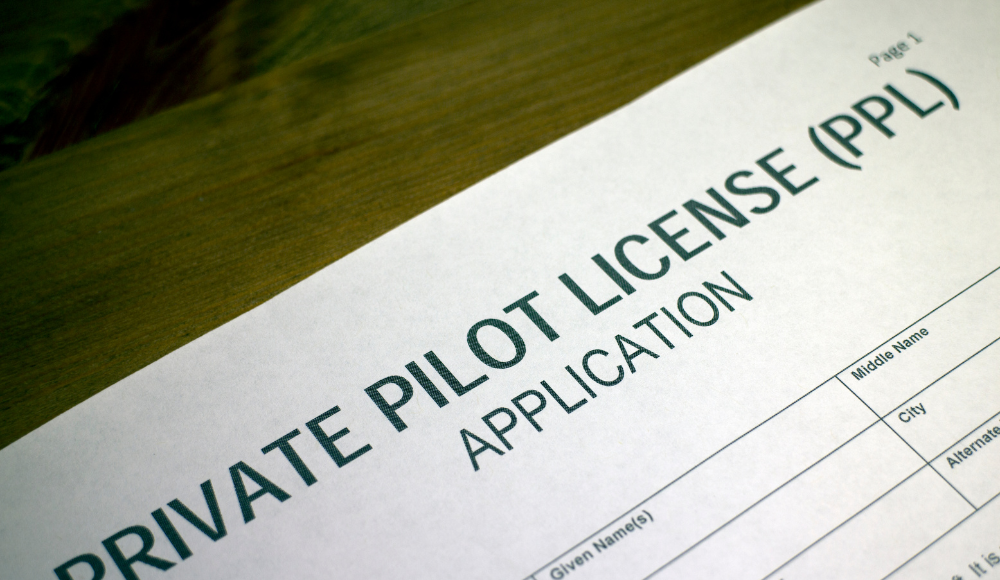 Close-up of a private pilot license application form, the first step to becoming a licensed pilot.